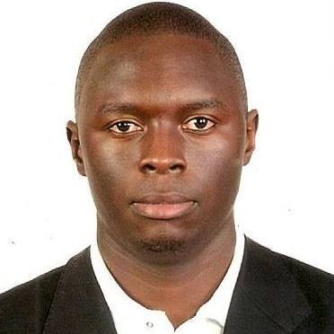 A headshot of Javis Lubwama, Programs Coordinator and Advisor at LeadMinds Africa.