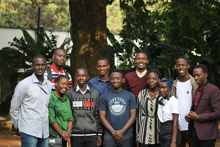 A group of mentees posing after a lesson.