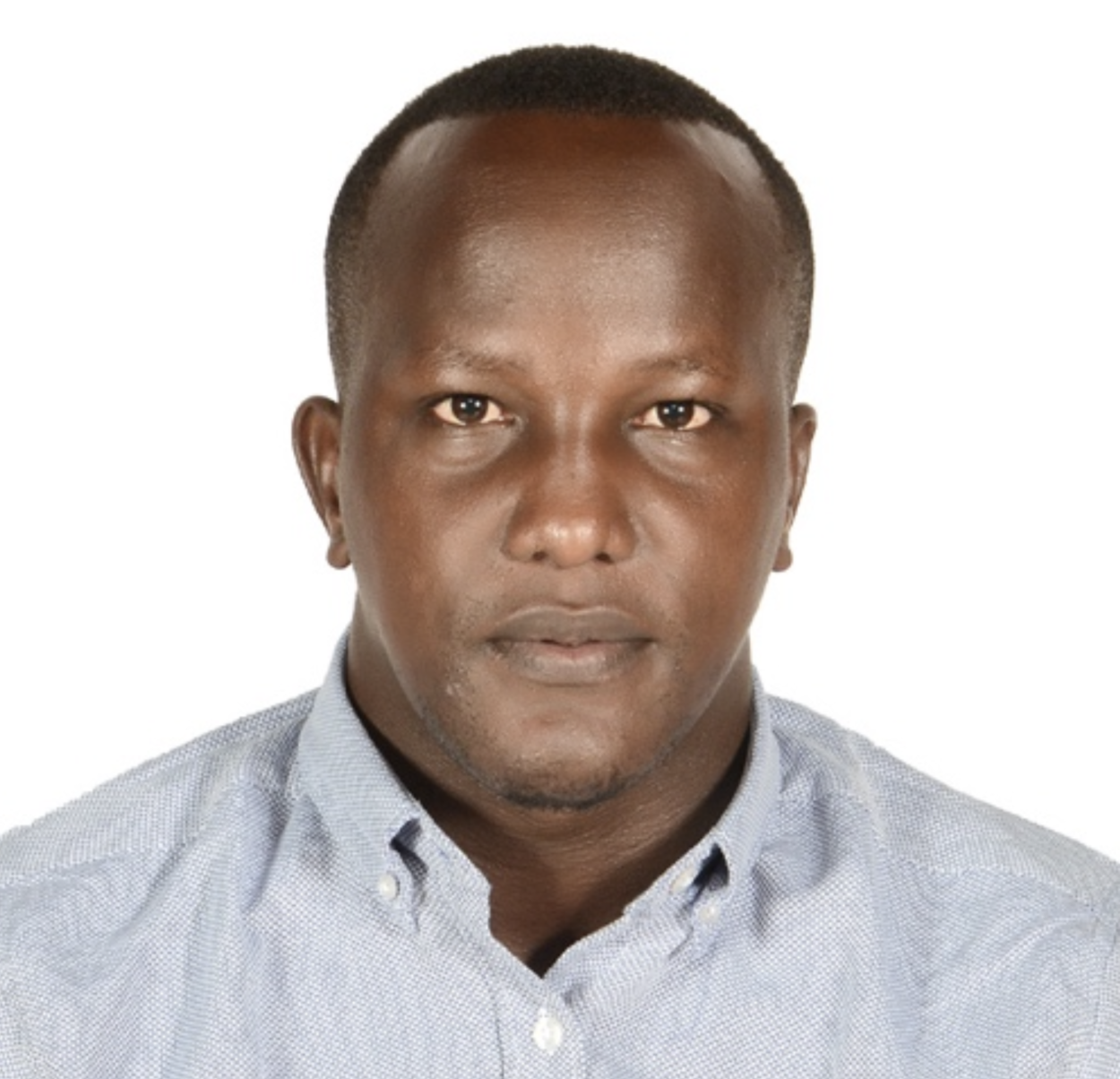 A headshot of our Founder, Enock Nkulanga.