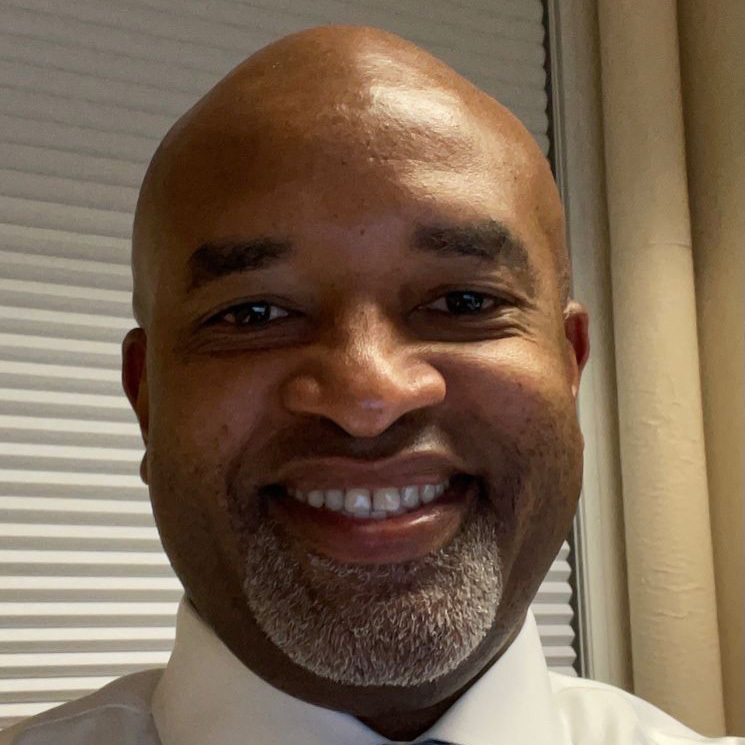 A headshot of Gary D. Scott, Vice-Chairman of the Leadminds Africa Board of Directors